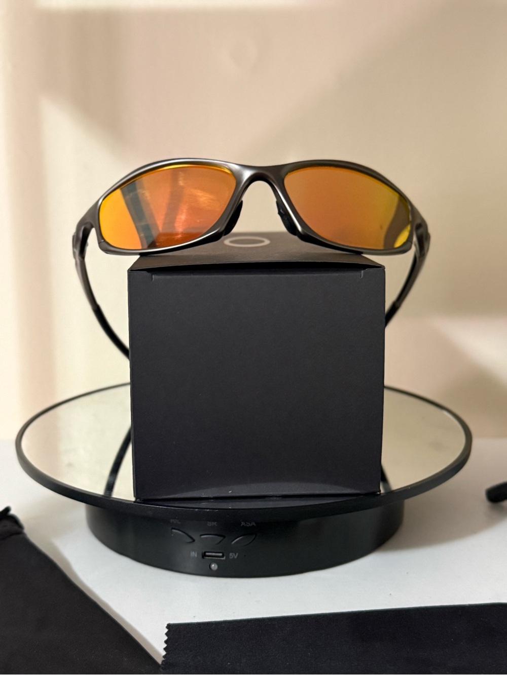 Oakley Sunglasses with Orange Mirrored Lenses and Black Frame